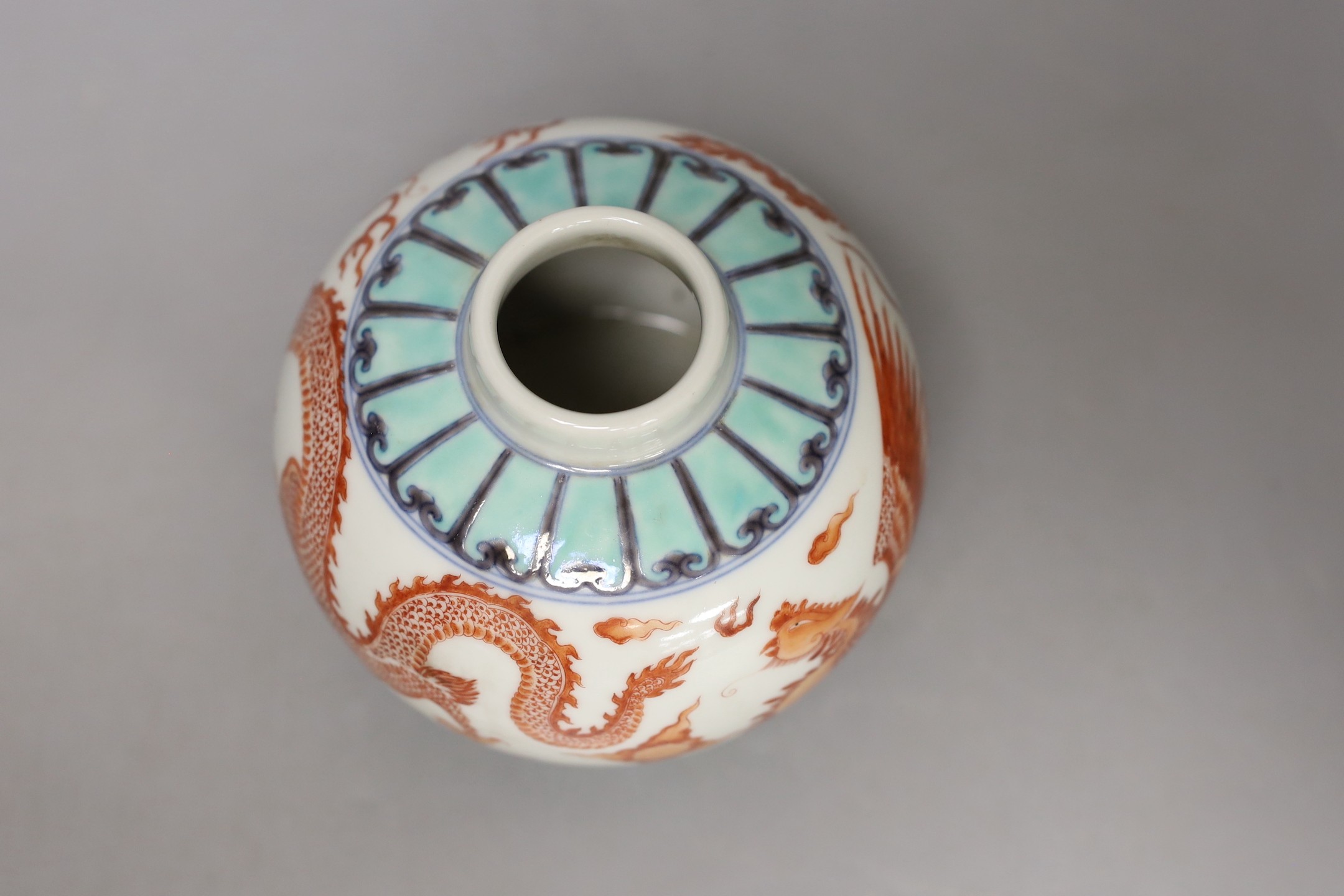 A Chinese doucai jar and cover, 12 cms high.